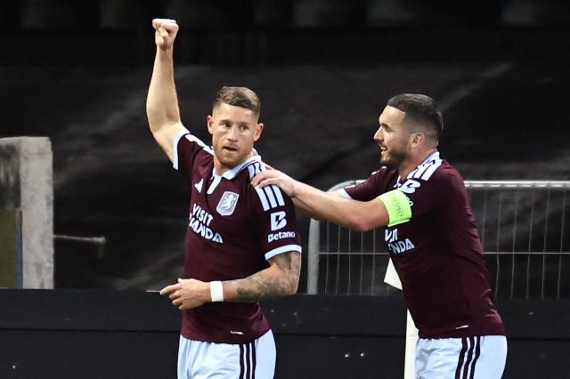 Aston Villa's English midfielder  #06 Ross Barkley (L) celebrates with Aston Villa's Scottish midfielder  #07 John McGinn (R) after scoring the opening goal during the UEFA Champions League, league phase football match between Aston Villa and Viking at Villa Park in Birmingham, central England on October 21, 2026. (Photo by Henry NICHOLLS / AFP)