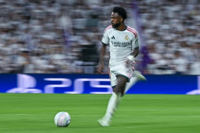 Real Madrid's Brazilian forward #07 Vinicius Junior runs with the ball during their UEFA Champions League first round day 3 football match between Real Madrid CF and RB Leipzig at the Santiago Bernabeu stadium in Madrid on October 21, 2026. (Photo by Javier SORIANO / AFP)