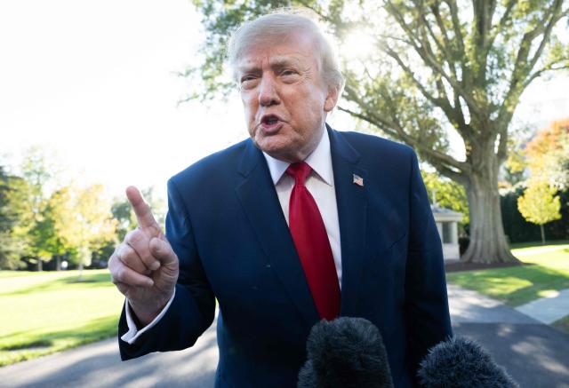 US President Donald Trump speaks to the media prior to departure on Marine One from the South Lawn of the White House in Washington, DC, October 21, 2026. Trump is travelling to South Carolina to attend a rally ahead of the midterm elections. (Photo by SAUL LOEB / AFP)