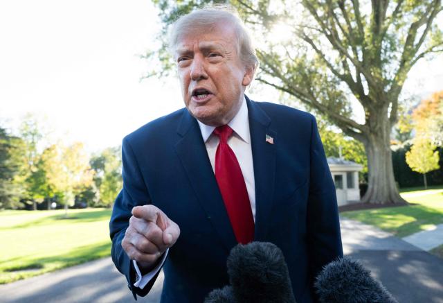 US President Donald Trump speaks to the media prior to departure on Marine One from the South Lawn of the White House in Washington, DC, October 21, 2026. Trump is travelling to South Carolina to attend a rally ahead of the midterm elections. (Photo by SAUL LOEB / AFP)