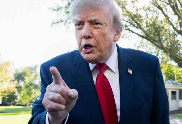 US President Donald Trump speaks to the media prior to departure on Marine One from the South Lawn of the White House in Washington, DC, October 21, 2026. Trump is travelling to South Carolina to attend a rally ahead of the midterm elections. (Photo by SAUL LOEB / AFP)