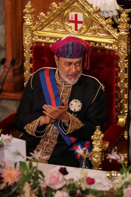 Oman's Sultan Haitham bin Tariq applauds during a State Banquet at The Guildhall in The City of London, on October 21, 2026, the second day of a three-day State Visit to the United Kingdom by The Sultan of Oman. (Photo by Isabel Infantes / POOL / AFP)
