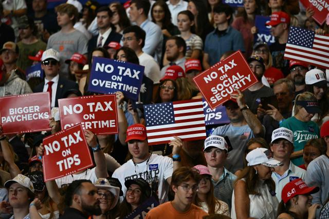 Supporters wait for US President Donald Trump to speak during a campaign rally at T. Ed Garrison Arena in Pendleton, South Carolina on October 21, 2026. (Photo by Kent NISHIMURA / AFP)