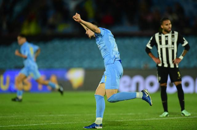 Montevideo City Torque's Argentine defender #03 Kevin Silva celebrates scoring his team's first goal during the Copa Sudamericana semifinal second leg football match between Uruguay's Montevideo City Torque and Brazil's Atletico Mineiro at the Centenario stadium in Montevideo on October 21, 2026. (Photo by Dante FERNANDEZ / AFP)