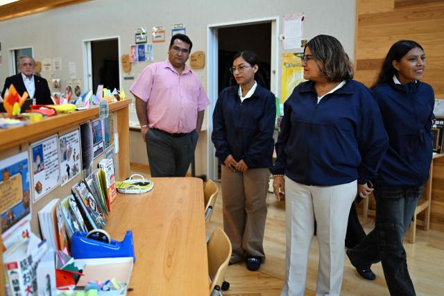 Belen mayor Lina Arista Lopez (2nd R), Wendy Sangama (R) and Ketsi Yahuarcani (C), guests from Peru's Belen district, visit a primary school in Nanmoku village, Japan's Gunma prefecture on September 26, 2026. In a misty mountain village in Japan, residents recently welcomed unlikely guests from a Peruvian district along the Amazon River, seeing a chance to revive an ageing community facing extinction. Nanmoku village officials hope a sister-city agreement, which promotes cultural and people-to-people ties, will ultimately attract young people from Belen to live in Nanmoku, although how they might obtain residency remains unclear. (Photo by Rie KIKUCHI / AFP) / To go with AFP story Japan-Peru-social-population-demographics, FOCUS by Natsuko Fukue and Junior Raborg