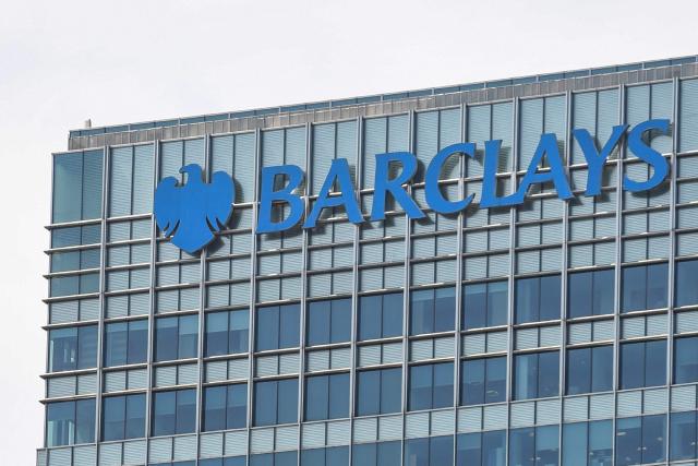 (FILES) The headquarters of the British bank Barclays is seen at the Canary Wharf district of east London on June 20, 2017. British bank Barclays on October 22, 2026 announced plans to cut around 5,000 jobs, or roughly five percent of its global workforce, as it leans on artificial intelligence to become more efficient. (Photo by Paul ELLIS / AFP)
