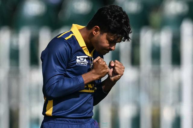 Sri Lanka's Dunith Wellalage celebrates after taking the wicket of England's Tom Banton during the one-day international (ODI) tri-series cricket match between England and Sri Lanka at the Rawalpindi Cricket Stadium in Rawalpindi on October 22, 2026. (Photo by FAROOQ NAEEM / AFP)