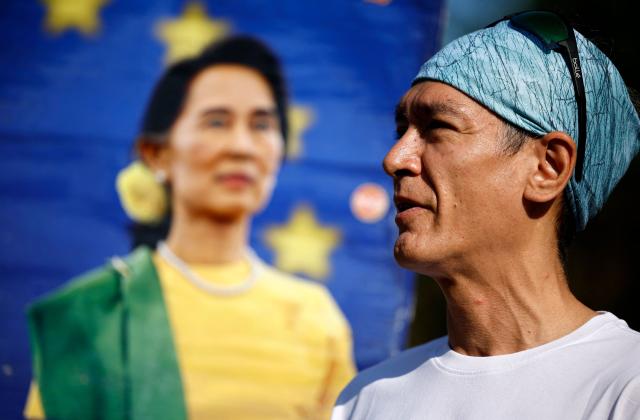(FILES) Kim Aris, son of Aung San Suu Kyi, speaks to supporters before taking part in a run on his mother's 80th birthday, to raise awareness of her ongoing incarceration, in Hyde Park in London on June 19, 2025. The son of Myanmar's Aung San Suu Kyi said on October 22, 2026 he was allowed to speak to the detained former democratic leader for the first time in more than five years. (Photo by BENJAMIN CREMEL / AFP)