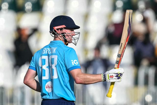 England's captain Harry Brook celebrates after scoring a half-century (50 runs) during the one-day international (ODI) tri-series cricket match between England and Sri Lanka at the Rawalpindi Cricket Stadium in Rawalpindi on October 22, 2026. (Photo by FAROOQ NAEEM / AFP)