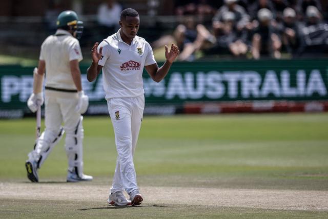 South Africa's Kagiso Rabada delivers a ball on day five of the second Test match between South Africa and Australia at St Georges Park in Gqeberha on October 22, 2026. Australia were made to follow on after being dismissed for just 99 in reply to South Africa's first innings total of 425 for nine declared, a deficit of 326 runs, on day four at Gqeberha. (Photo by Marco Longari / AFP)