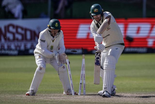 Australia's Scott Boland is bowled by South Africa's Wiaan Mulder on day five of the second Test match between South Africa and Australia at St Georges Park in Gqeberha on October 22, 2026. Australia were made to follow on after being dismissed for just 99 in reply to South Africa's first innings total of 425 for nine declared, a deficit of 326 runs, on day four at Gqeberha. (Photo by Marco Longari / AFP)