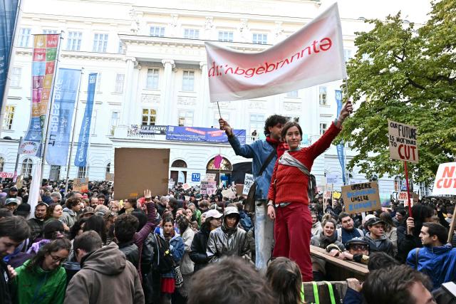 Students demonstrate against univesity budget cuts outside the Technical University in Vienna, Austria, on October 22, 2026. (Photo by Joe Klamar / AFP)