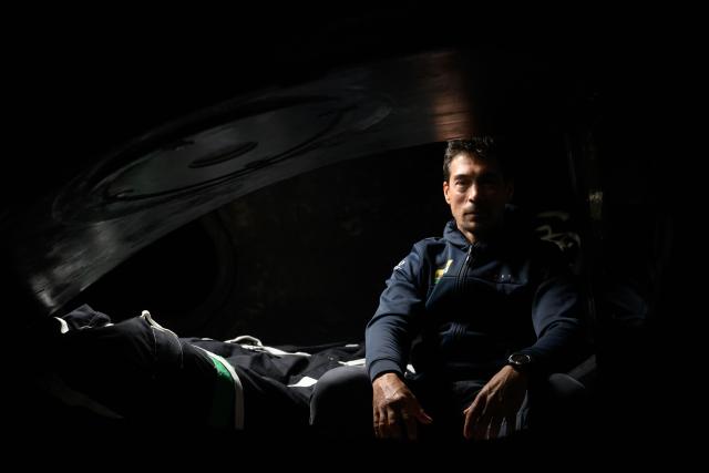 French skipper Davy Beaudart poses aboard his Imoca monohull 'Bureau Vallee' at the village of the Route du Rhum, in Saint-Malo, western France on October 22, 2026, a few days prior to the start of the 13th Route du Rhum - Destination Guadeloupe. From Saint-Malo in Brittany to Pointe-a-Pitre in Guadeloupe, over 100 skippers across 6 classes will take the start on November 1, 2026, in this solo transatlantic sailing race. (Photo by Loic VENANCE / AFP)