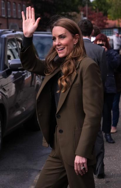 Britain's Catherine, Princess of Wales, greets well-wishers as she leaves after visiting Cafe 98 inside East Anglia's Children's Hospices' (EACH) shop in Hoveton, eastern England on October 22, 2026. Cafe 98, run by East Anglia's Children's Hospices (EACH), is the charity's first and only cafe, forming part of EACH's fundraising operation and serving as a community hub for local residents. (Photo by Ben Stansall / POOL / AFP)