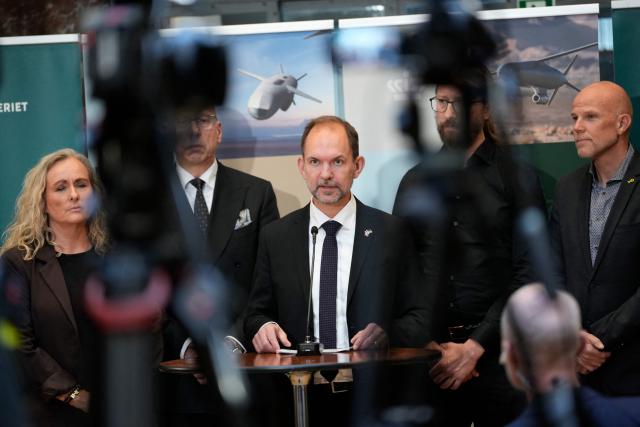 Denmark's Defence Minister Jeppe Bruus (C) addresses a press conference at the Ministry of Defence in Copenhagen, on October 22, 2026. Denmark said on October 22, 2026 it was buying long-range missiles from US and Norwegian manufacturers, one year after the Scandinavian country announced its intention to acquire such weapons to deter Russia.
"We have bought two different missile systems: Norwegian strike missiles from Kongsberg, which can in particular be launched from our F-35 fighter jets, and Anthem missiles from the American company Covenant, which can be fired from land," Danish Defence Minister Jeppe Bruus told a press conference, without specifying the number of missiles or the costs. (Photo by Emil Helms / Ritzau Scanpix / AFP) / Denmark OUT