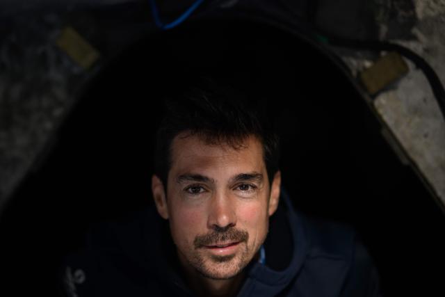 French skipper Davy Beaudart poses aboard his Imoca monohull 'Bureau Vallee' at the village of the Route du Rhum, in Saint-Malo, western France on October 22, 2026, a few days prior to the start of the 13th Route du Rhum - Destination Guadeloupe. From Saint-Malo in Brittany to Pointe-a-Pitre in Guadeloupe, over 100 skippers across 6 classes will take the start on November 1, 2026, in this solo transatlantic sailing race. (Photo by Loic VENANCE / AFP)