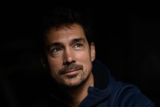 French skipper Davy Beaudart poses aboard his Imoca monohull 'Bureau Vallee' at the village of the Route du Rhum, in Saint-Malo, western France on October 22, 2026, a few days prior to the start of the 13th Route du Rhum - Destination Guadeloupe. From Saint-Malo in Brittany to Pointe-a-Pitre in Guadeloupe, over 100 skippers across 6 classes will take the start on November 1, 2026, in this solo transatlantic sailing race. (Photo by Loic VENANCE / AFP)