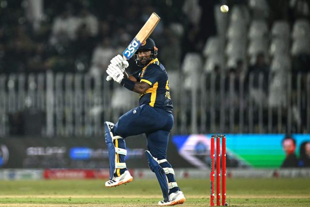 Sri Lanka's Avishka Fernando plays a shot during the one-day international (ODI) tri-series cricket match between England and Sri Lanka at the Rawalpindi Cricket Stadium in Rawalpindi on October 22, 2026. (Photo by FAROOQ NAEEM / AFP)