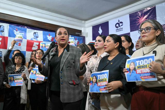 Ecuadorean Gabriela Rivadeneira, president of Citizen Revolution (CR) party, speaks during a press conference following the arrest of its former presidential candidate Luisa Gonzalez, at the party headquarters in Quito, Ecuador on October 22, 2026. Gonzalez, who had been under investigation by authorities since January over alleged irregular funding from Venezuela for her 2023 campaign, was arrested on October 22, 2026, in Manabi, although the police confirmed her detention without specifying the reasons. (Photo by Rodrigo BUENDIA / AFP)