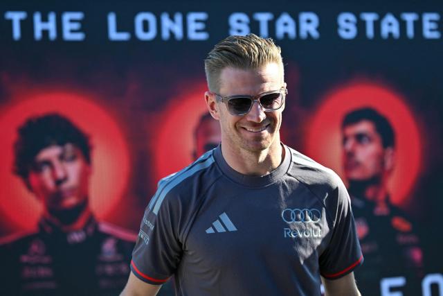 Audi's German driver Nico Hulkenberg arrives in the paddock ahead of the United States Formula One Grand Prix at the Circuit of the Americas in Austin, Texas, on October 22, 2026. The United States Grand Prix will take place on Sunday, October 25. (Photo by ANGELA WEISS / AFP)