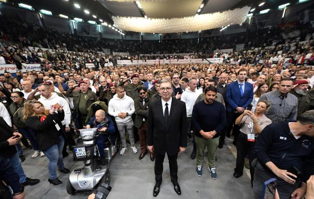 Former president of Serbia, Aleksandar Vucic poses with supporters as they gather during an election campaign "Aleksandar Vucic for Prime Minister" rally in Belgrade, Serbia, on October 22, 2026, three days before the country's snap elections. The vote follows nearly two years of anti-corruption protests sparked by the November 2024 collapse of a railway station canopy in Novi Sad that killed 16 people and grew into a student-led movement demanding early elections. Aleksandar Vucic resigned as president on September 27, 2026 to lead the SNS election campaign and seek a return as prime minister. (Photo by AFP)