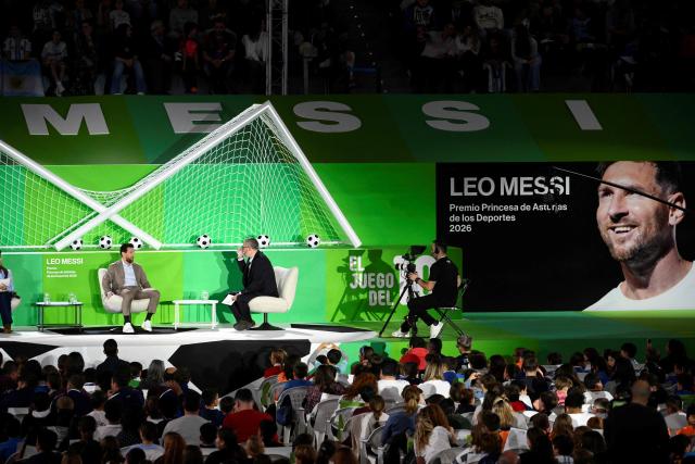 Argentinian football legend Lionel Messi (L) takes part in an event for youth at the sport hall in Oviedo on October 22, 2026 on the eve of being awarded the Princess of Asturias Prize for Sport. The 2026 Princess of Asturias Awards ceremony will take place tomorrow October 23, 2026. (Photo by Miguel RIOPA / AFP)