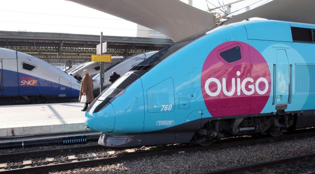 (FILES) The new low-cost TGV high-speed train "Ouigo" is seen at the Gare de Lyon railway station in Paris on February 19, 2013. France's state rail firm SNCF opened its online booking service for its new budget train service 'Ouigo' on February 19 inspired by the budget airline model. The train will start transporting its first passengers from April 2, with the Ouigo service operating from Marne-la-Vallйe near Disneyland Paris, Lyon-Saint-Exupйry airport, Marseilles and Montpellier. AFP PHOTO/JACQUES DEMARTHON. The TGV will celebrate its 45th anniversary in 2026 and will have carried nearly 3 billion passengers, according to SNCF. The fifth-generation TGV M, a modular high-speed train, is due to enter service under the Inoui brand on November 6 on the Paris–Lyon–Marseille route. Its modular design will allow for more efficient thermal management. (Photo by JACQUES DEMARTHON / AFP)