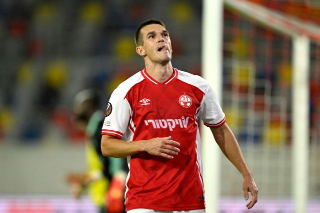 Hapoel Beer Sheva's Serbian forward #66 Igor Zlatanovic reacts during the UEFA Europa League league phase matchday 3 football match between Royale Union Saint-Gilloise and Hapoel Beer Sheva in Duesseldorf, western Germany, on October 22, 2026. (Photo by INA FASSBENDER / AFP)