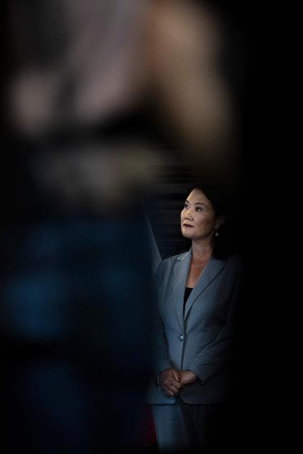 Peru's President Keiko Fujimori gestures during a press conference at the government palace in Lima on October 22, 2026. (Photo by ERNESTO BENAVIDES / AFP)