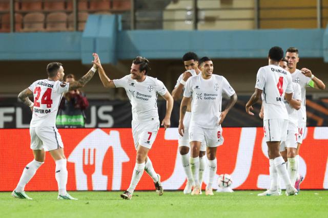 Leverkusen's German midfielder #07 Jonas Hofmann (2L) celebrates with his teamates after scoring his team's second during the UEFA Europa League, league phase matchday 3, football match between OFI Crete FC and Bayer Leverkusen at the Pankritio Stadium in Heraklion on October 22, 2026. (Photo by Costas METAXAKIS / AFP)