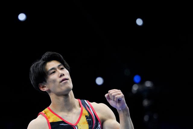 Japan's Daiki Hashimoto reacts as he competes on the Floor Exercise in the Men's Individual All-Around Final during the 54th FIG Artistic Gymnastics World Championships, in Rotterdam, southern Netherlands, on October 22, 2026. (Photo by JOHN THYS / AFP)