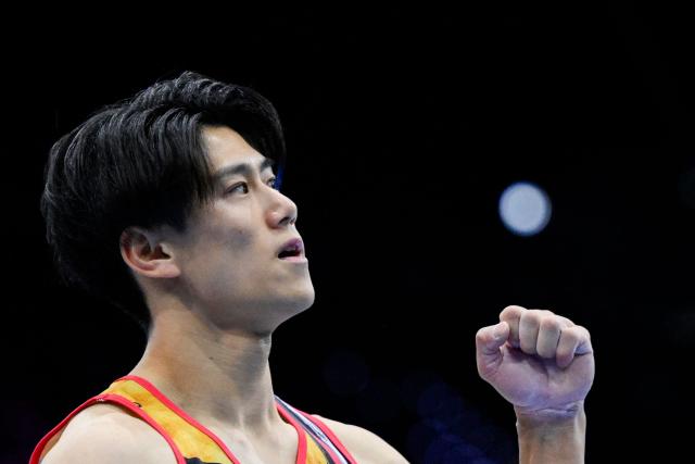 Japan's Daiki Hashimoto reacts as he competes on the Floor Exercise in the Men's Individual All-Around Final during the 54th FIG Artistic Gymnastics World Championships, in Rotterdam, southern Netherlands, on October 22, 2026. (Photo by JOHN THYS / AFP)