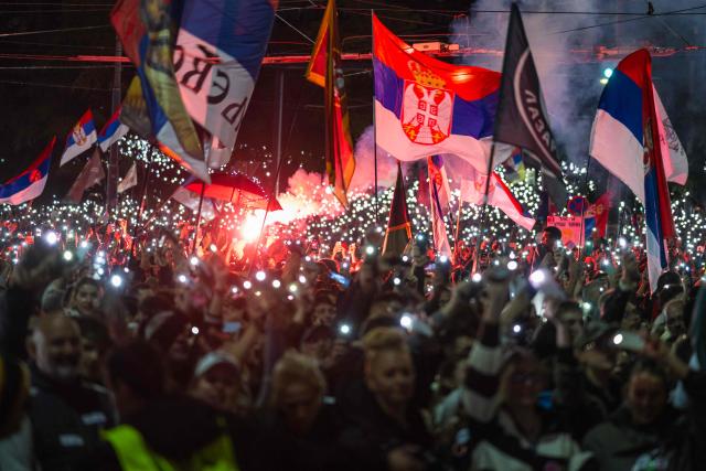Supporters of Serbia's student-led movement attend the final campaign rally of the student-backed election list in central Belgrade on October 22, 2026, ahead of the country's snap parliamentary elections on October 25. The vote follows nearly two years of student-led protests sparked by the November 2024 collapse of a railway station canopy in Novi Sad that killed 16 people, with demands for early elections becoming a central goal of the movement. The student-backed list is challenging the ruling Serbian Progressive Party (SNS), led in the campaign by former president Aleksandar Vucic, who resigned in September to run for prime minister. (Photo by Andrej ISAKOVIC / AFP)