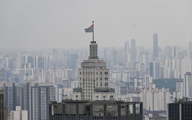 Aerial view of Farol Santander Building in downtown Sao Paulo, Brazil, on October 22, 2026. Brazil's President Lula da Silva and right-wing senator Flavio Bolsonaro head to a runoff election on October 25, a race that has become mired in allegations of social media malfeasance. (Photo by Juan BARRETO / AFP)