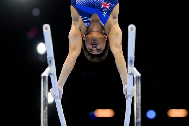 Great Britain's Jake Jarman competes on the Parallel Bars in the Men's Individual All-Around Final during the 54th FIG Artistic Gymnastics World Championships, in Rotterdam, southern Netherlands, on October 22, 2026. (Photo by JOHN THYS / AFP)