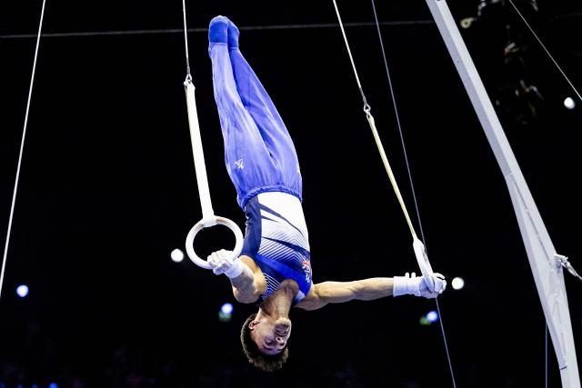 Great Britain's Jake Jarman competes on the Rings in the Men's Individual All-Around Final during the 54th FIG Artistic Gymnastics World Championships, in Rotterdam, southern Netherlands, on October 22, 2026. (Photo by Iris van den Broek / ANP / AFP) / Netherlands OUT