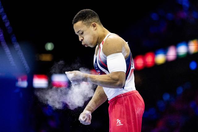Great Britain's Joe Fraser prepares to compete on the Parallel Bars in the Men's Individual All-Around Final during the 54th FIG Artistic Gymnastics World Championships, in Rotterdam, southern Netherlands, on October 22, 2026. (Photo by Iris van den Broek / ANP / AFP) / Netherlands OUT