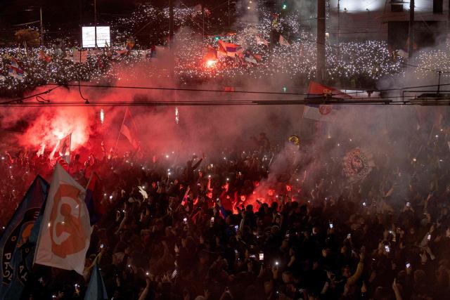 Supporters of Serbia's student-led movement attend the final campaign rally of the student-backed election list in central Belgrade on October 22, 2026, ahead of the country's snap parliamentary elections on October 25. The vote follows nearly two years of student-led protests sparked by the November 2024 collapse of a railway station canopy in Novi Sad that killed 16 people, with demands for early elections becoming a central goal of the movement. The student-backed list is challenging the ruling Serbian Progressive Party (SNS), led in the campaign by former president Aleksandar Vucic, who resigned in September to run for prime minister. (Photo by Mitar MITROVIC / AFP)