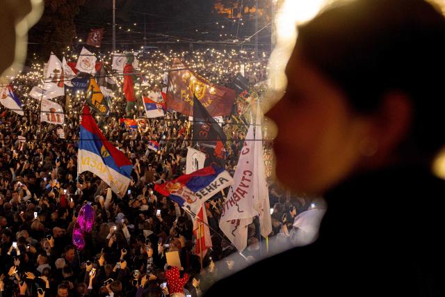 Supporters of Serbia's student-led movement attend the final campaign rally of the student-backed election list in central Belgrade on October 22, 2026, ahead of the country's snap parliamentary elections on October 25. The vote follows nearly two years of student-led protests sparked by the November 2024 collapse of a railway station canopy in Novi Sad that killed 16 people, with demands for early elections becoming a central goal of the movement. The student-backed list is challenging the ruling Serbian Progressive Party (SNS), led in the campaign by former president Aleksandar Vucic, who resigned in September to run for prime minister. (Photo by Mitar MITROVIC / AFP)