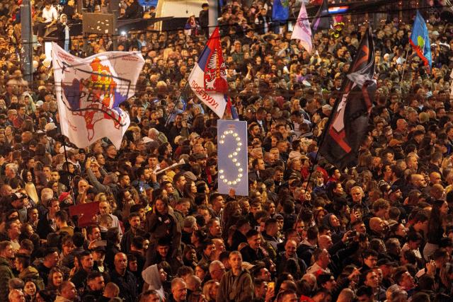 Supporters of Serbia's student-led movement attend the final campaign rally of the student-backed election list in central Belgrade on October 22, 2026, ahead of the country's snap parliamentary elections on October 25. The vote follows nearly two years of student-led protests sparked by the November 2024 collapse of a railway station canopy in Novi Sad that killed 16 people, with demands for early elections becoming a central goal of the movement. The student-backed list is challenging the ruling Serbian Progressive Party (SNS), led in the campaign by former president Aleksandar Vucic, who resigned in September to run for prime minister. (Photo by Mitar MITROVIC / AFP)