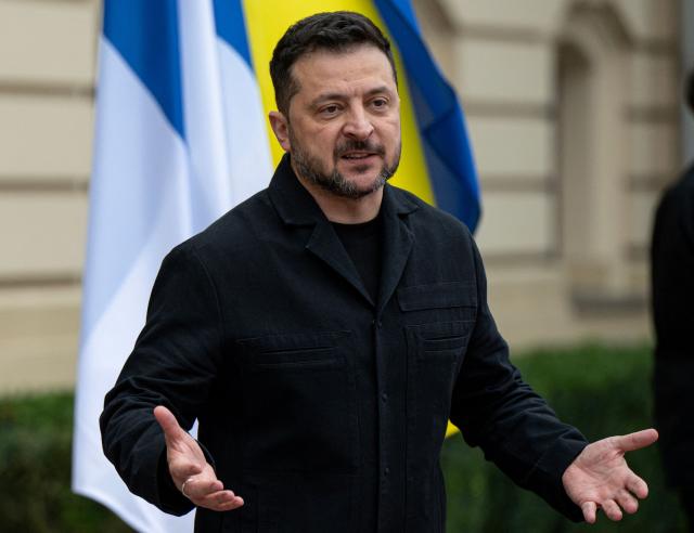 Ukraine's President Volodymyr Zelensky gestures as he addresses the media ahead of his meeting with Finland's Prime Minister in Kyiv on October 22, 2026, amid the Russian invasion of Ukraine. (Photo by Genya SAVILOV / AFP)