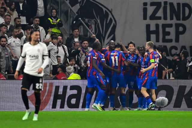 Crystal Palace's players celebrate after scoring their second goal during the UEFA Europa League, league phase matchday 3, football match between Besiktas and Crystal Palace at the Besiktas Tupras Stadium in Istanbul, on October 22, 2026. (Photo by Yasin AKGUL / AFP)
