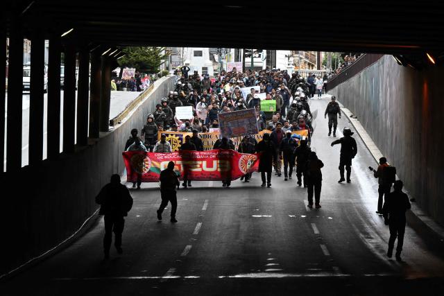 Teachers march to protest government's economic and educational policies in La Paz on October 22, 2026. (Photo by Aizar RALDES / AFP)