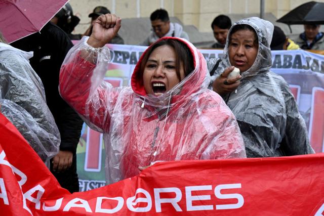 Teachers march to protest government's economic and educational policies in La Paz on October 22, 2026. (Photo by Aizar RALDES / AFP)