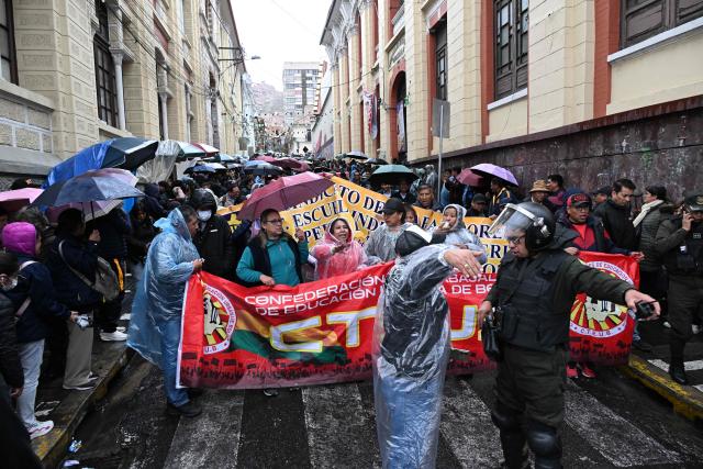 Teachers march to protest government's economic and educational policies in La Paz on October 22, 2026. (Photo by Aizar RALDES / AFP)