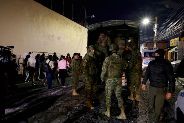 Army soldiers patrol outside the Pichincha Provisional detention centre in Quito on October 22, 2026. Eight inmates died on October 22, 2026, during riots at two prisons in Ecuador, the agency responsible for managing the country's prisons (SNAI) reported. (Photo by AFP)