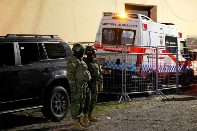 Army soldiers patrol outside the Pichincha Provisional detention centre in Quito on October 22, 2026. Eight inmates died on October 22, 2026, during riots at two prisons in Ecuador, the agency responsible for managing the country's prisons (SNAI) reported. (Photo by AFP)