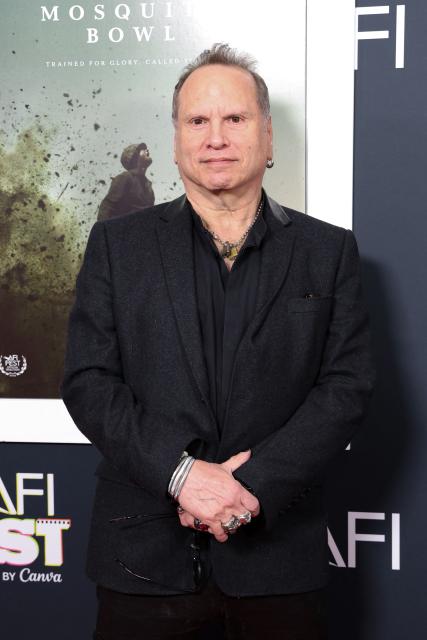 US author Buzz Bissinger attends AFI FEST "The Mosquito Bowl" world premiere at the TCL Chinese Theatre in Los Angeles on October 22, 2026. AFI FEST, presented by the American Film Institute, runs from October 21 to 25, 2026. (Photo by VALERIE MACON / AFP)