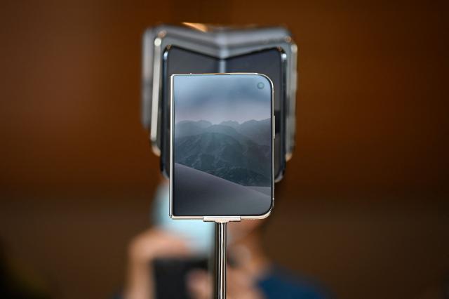 The iPhone Duo is displayed at an Apple store in Beijing on October 23, 2026. (Photo by WANG Zhao / AFP)