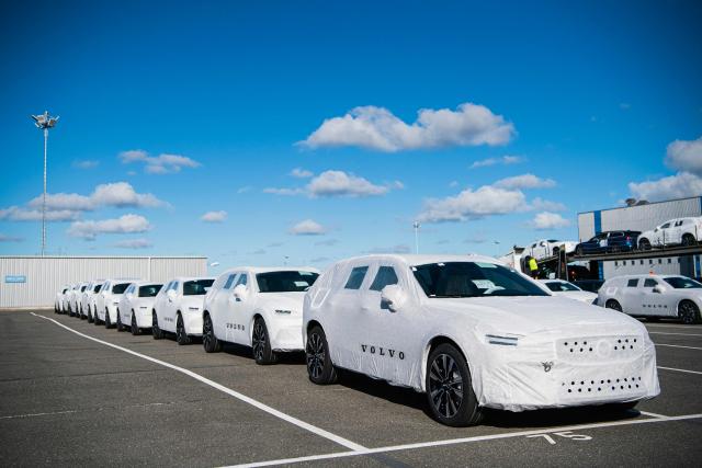 (FILES) This photograph shows finished cars wait to be transported at Swedish auto maker Volvo Cars's Torslanda production plant in Gothenburg, Sweden on August 25, 2020. Swedish carmaker Volvo Cars, owned by Chinese group Geely, announced on October 23, 2026, it would cut about 2,500 jobs worldwide, 2,000 of which are in Sweden, saying it was facing "a very tough environment", including US tariffs and "hypercompetition" from local brands in China. (Photo by Jonathan NACKSTRAND / AFP)